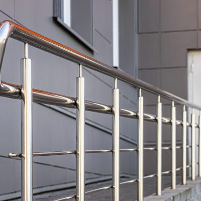 A ramp and metal railing in the hospital for the reception of patients and for the convenience of people with disabilities and the elderly